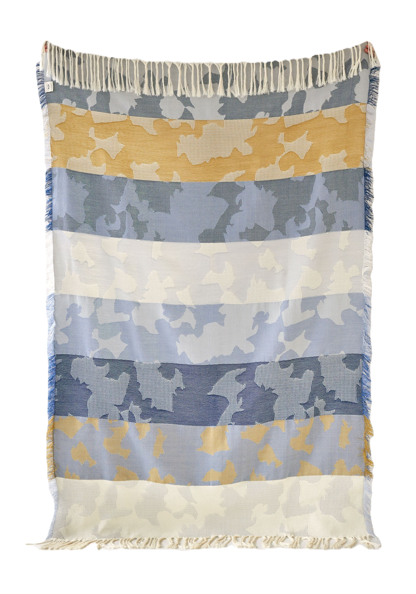 A striped wool throw blanket with varying shades of gray, beige, and blue, featuring a traditional craftsmanship-inspired design with fringes on the edges.