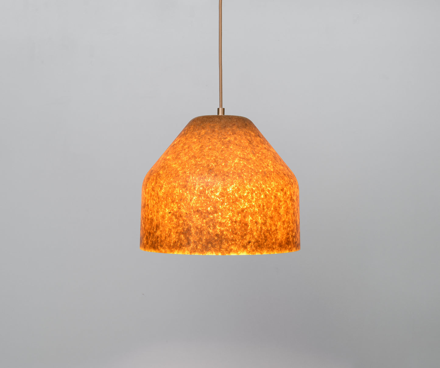 Pendant light with textured Ginkgo leaves shade on a gray background