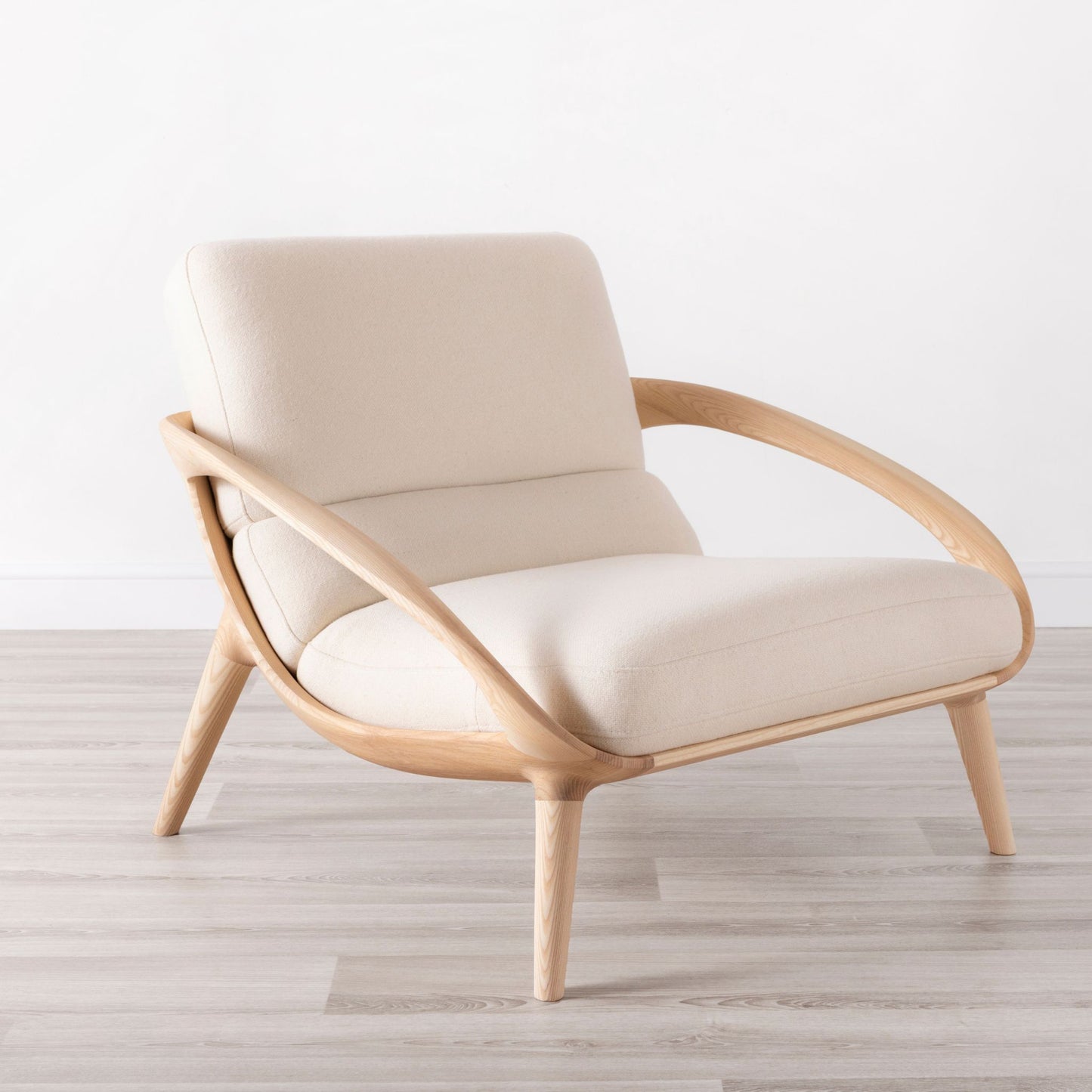 Moor lounge chair in ash with white wool upholstery