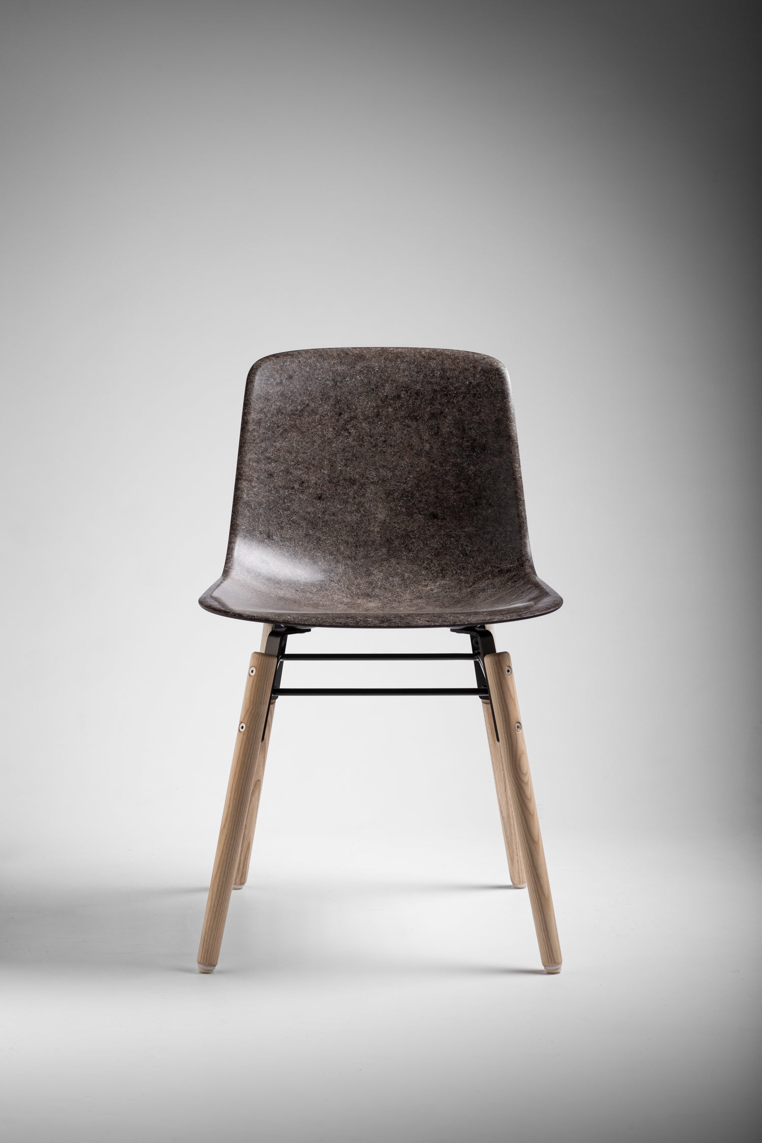 Hembury Chair in Stone Solidwool with oiled ash legs
