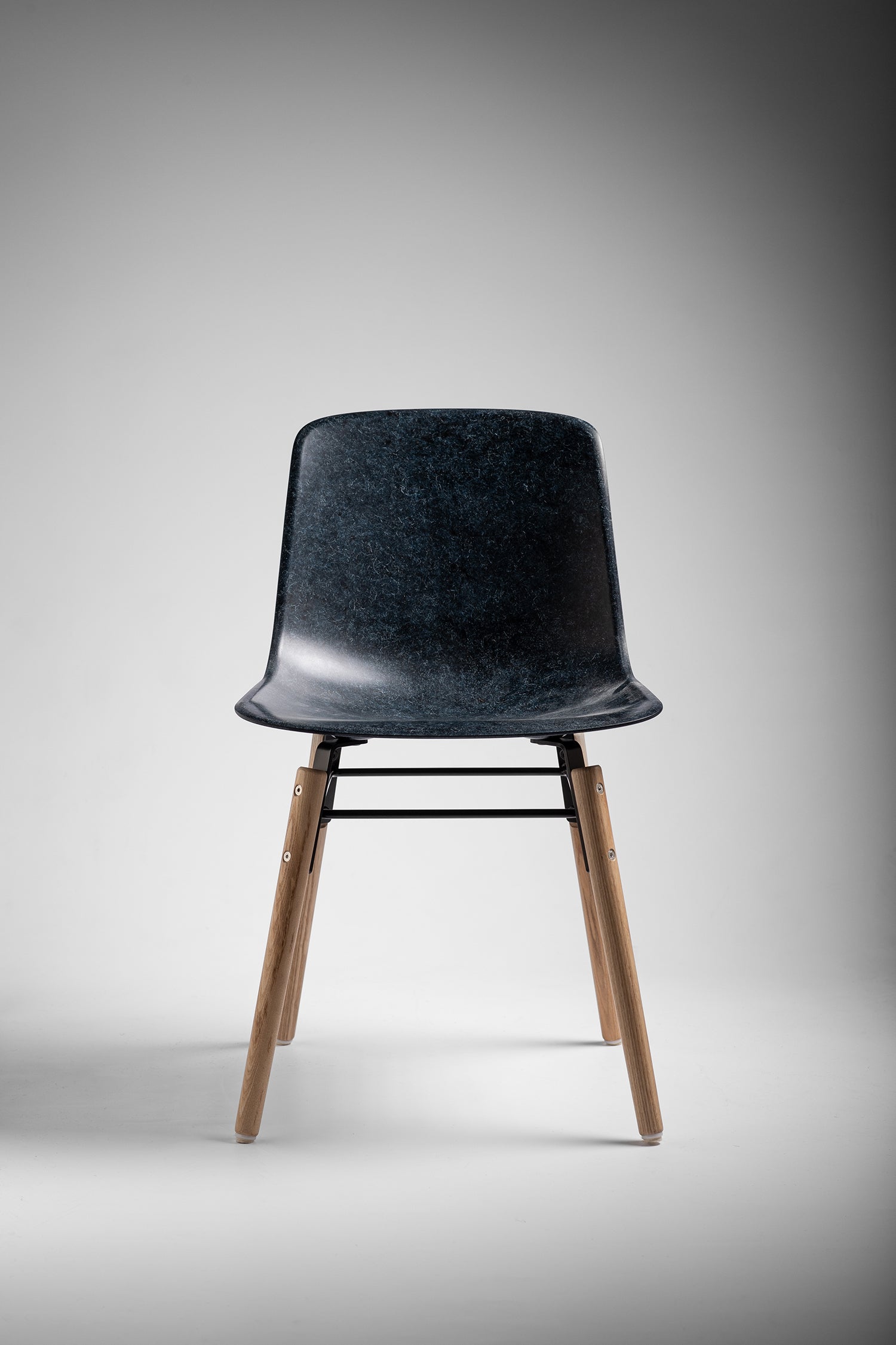 Hembury Chair in Ink Solidwool with oiled ash legs