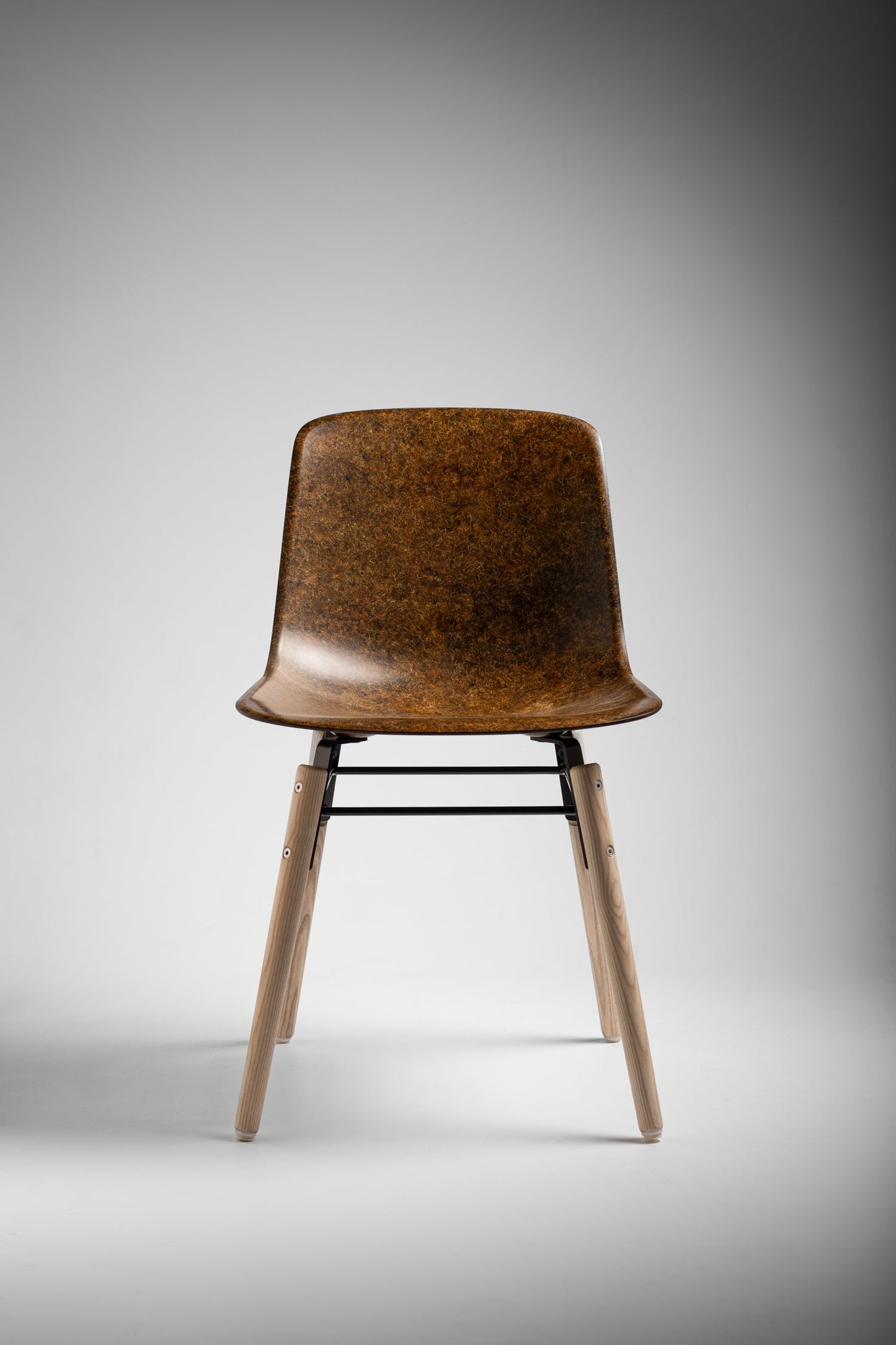 Hembury Chair in Ochre Solidwool with oiled ash legs