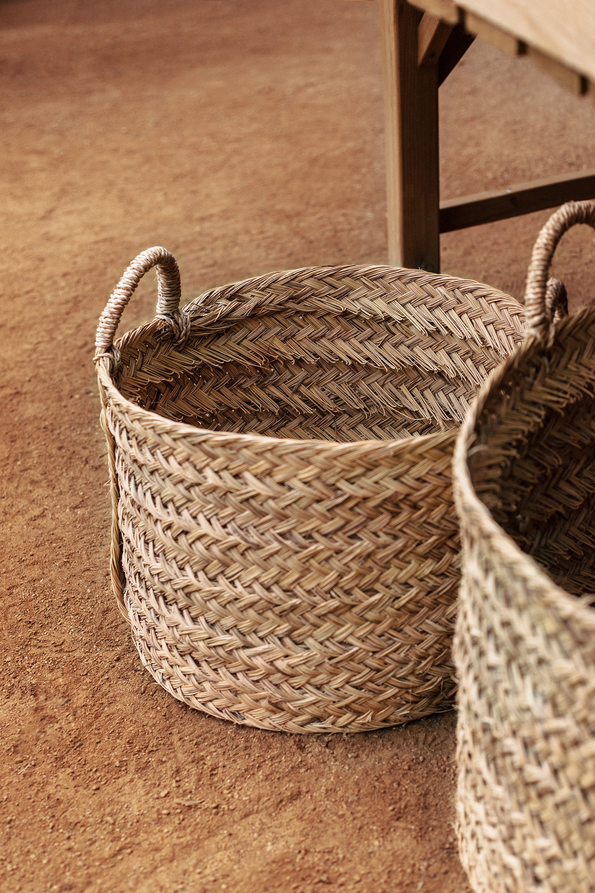 WOVEN basket in natural material for multiuse  interior design empty
